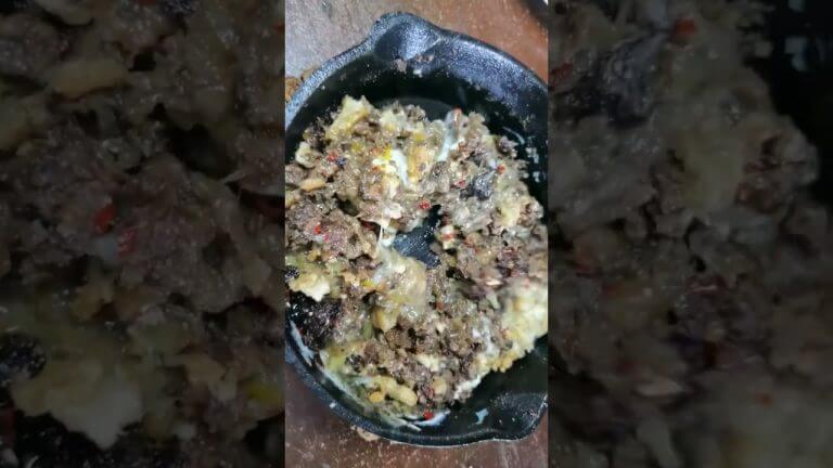 Best Sizzling Pork Sisig with raw egg! best with rice or pulutan for beer!
