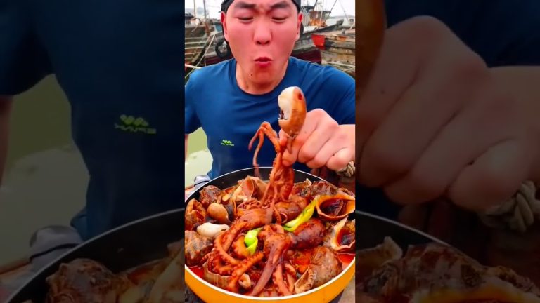 Chinese fisherman cooking and Eating fresh seafood…