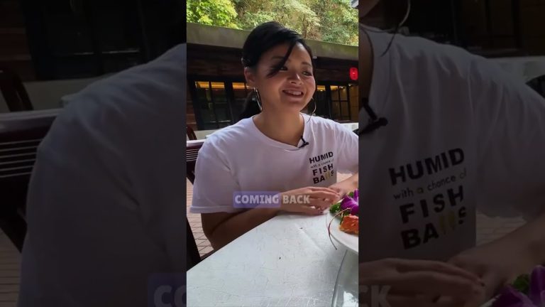 Chef assembles majestic lobster dish with flavorful sauce