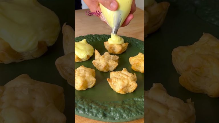 Puff pastry topped with creamy custard and fresh strawberries 🍓