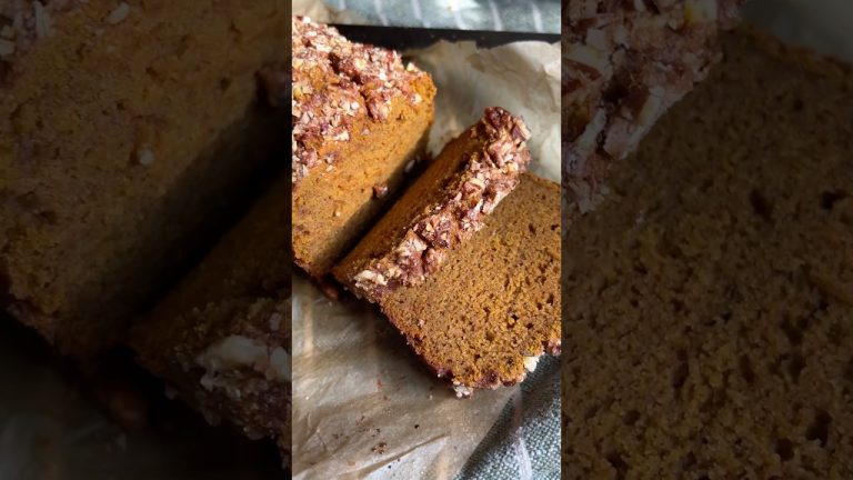 One-bowl pumpkin bread recipe! Moist loaf with a crunchy pecan topping and cozy fall spice flavor 🥰