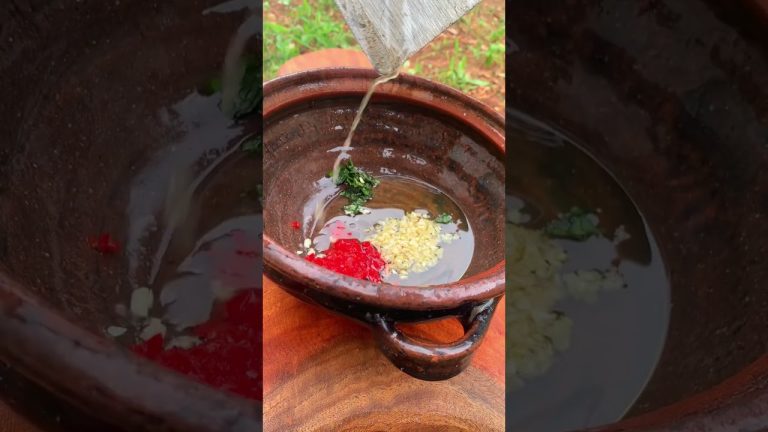 How to prepare fish with stone #mandiya #outdoors #outdoorcooking #lifehack #nature