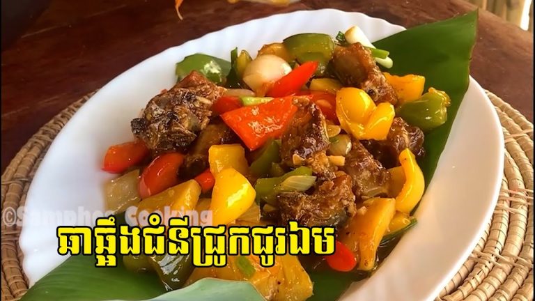 ឆាឆ្អឹងជំនីជ្រូកជូរឯម Yummy Cooking Pork Recipe || @samphosheng