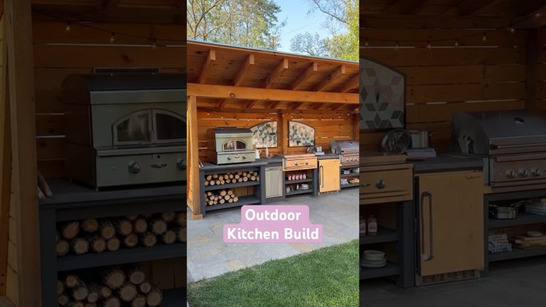 The outdoor kitchen we built during our backyard #renovation. Has #pizzaoven, flat top, and grill.