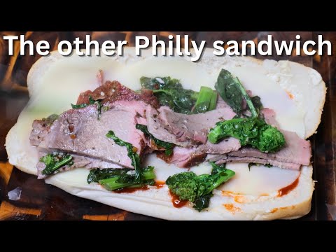 Sliced pork butt sandwich with broccoli rabe Straight out of Philly