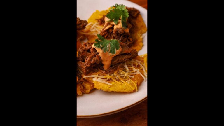 Shredded Beef & Cheese Topped Tostones