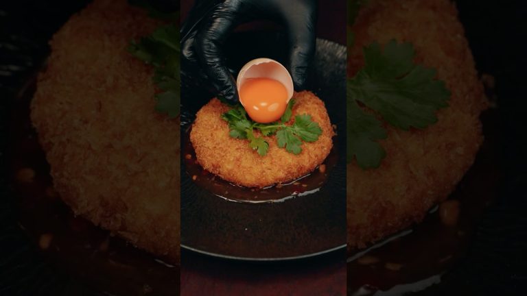 Golden, crispy perfection 🦀✨ Shaped these crab cakes by hand, dropped them in hot oil