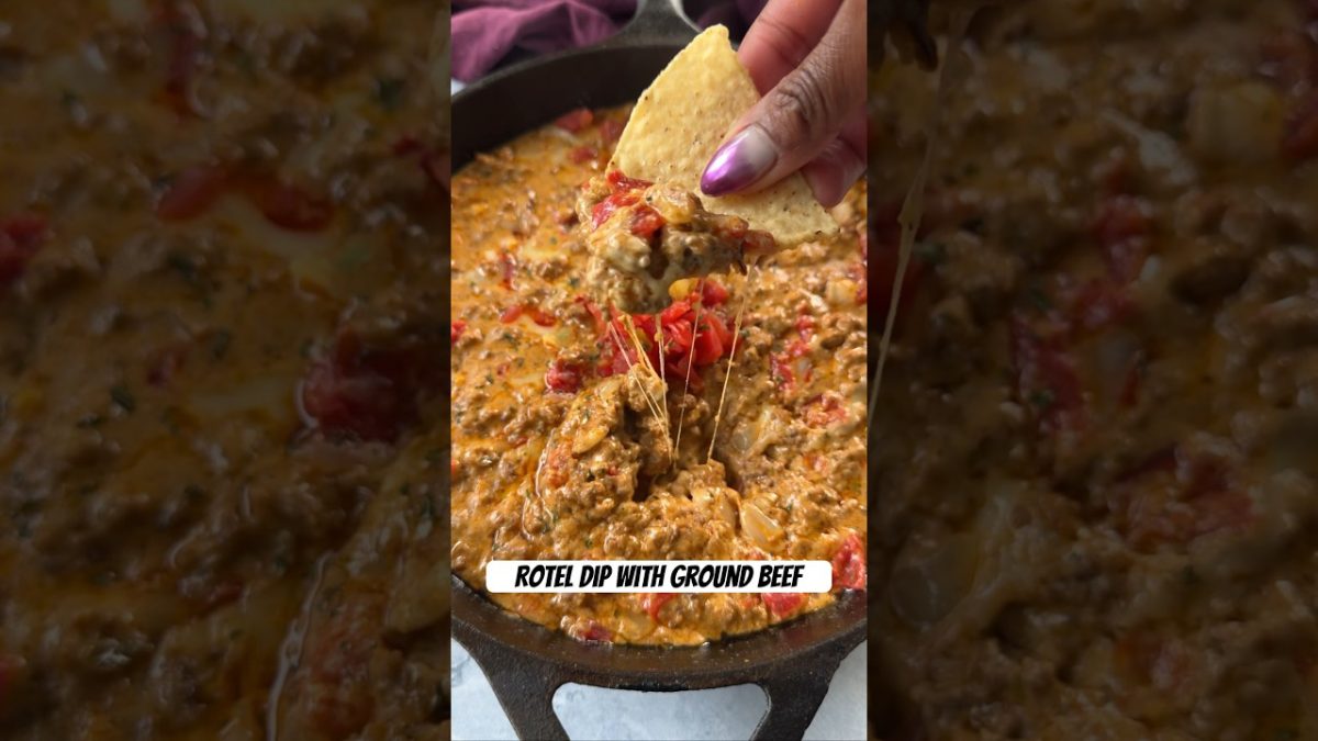 Cheesy Rotel Dip with Ground Beef is the perfect appetizer. #rotel #cheesedip #queso #beefrecipe