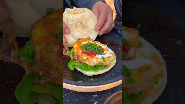 Chinese burger The rooster on the roof laid an egg.