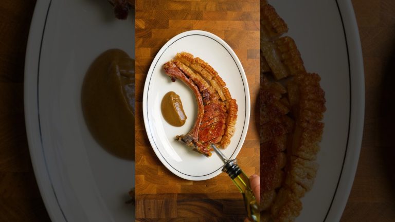Crispy skin pork chop cooked on the new @WeberBBQAusNZ  Genesis.