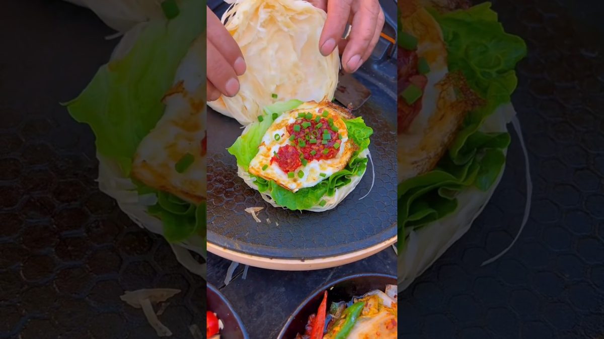 Chinese burger Grandpa's chickens all lay their eggs on the roof.